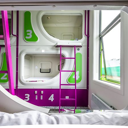 Lylo Christchurch Exteriör bild Interior of a capsule hotel